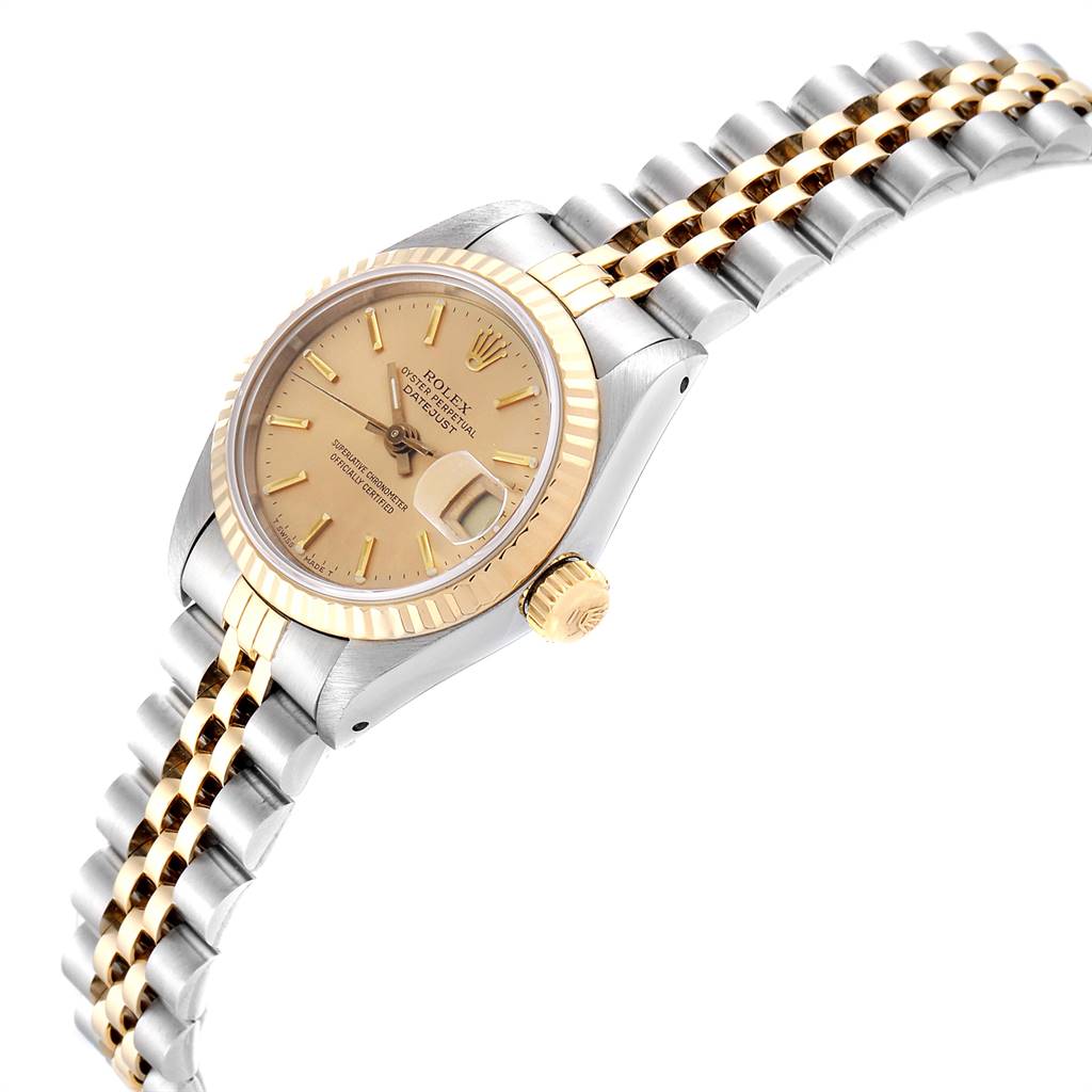 The image shows a side view of the Rolex Datejust 69173 Women's Stainless Steel Champagne Dial 69173 Women's Stainless Steel Champagne Dial watch, highlighting its gold bezel, crown, and two-tone bracelet.