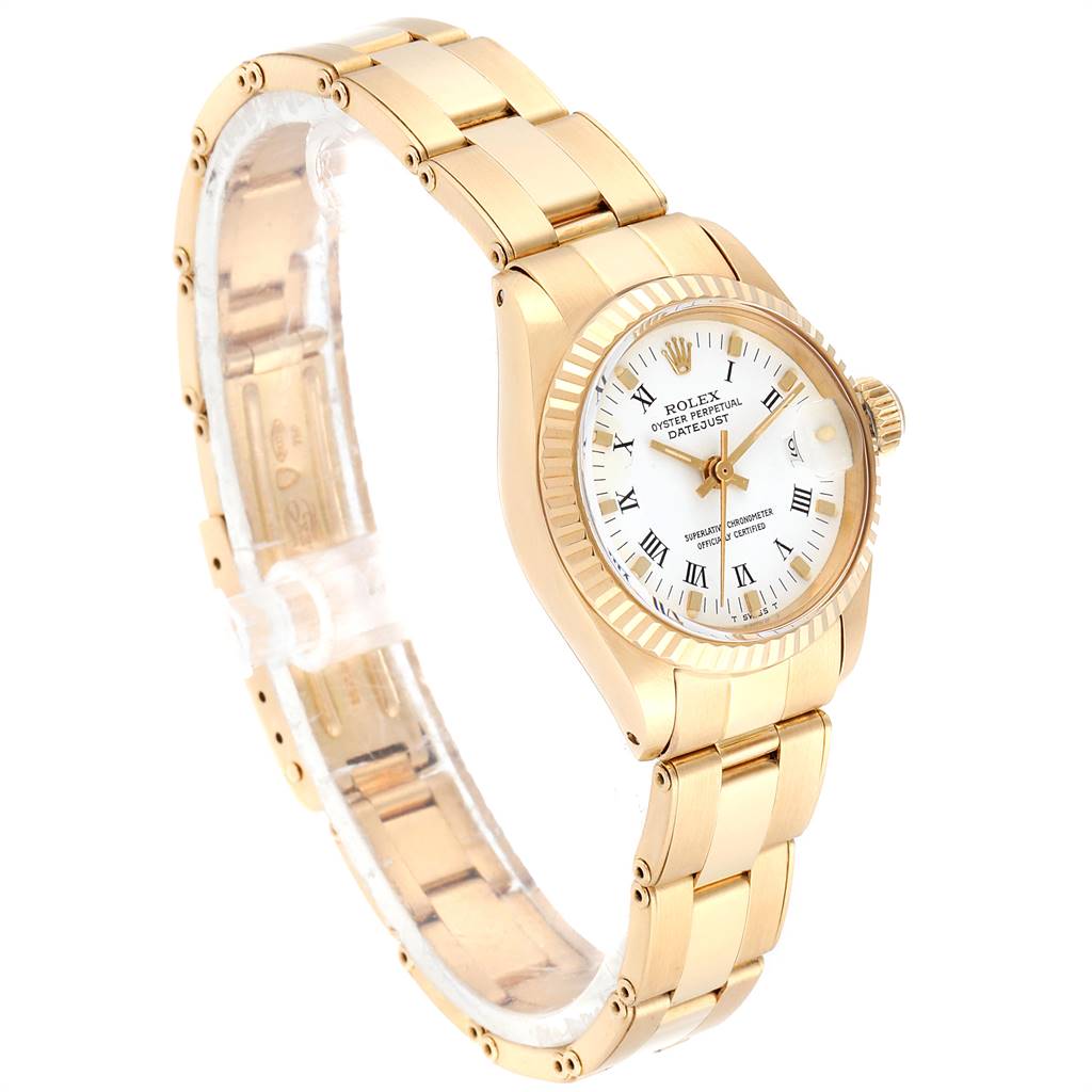 The image shows a side view of a Rolex Datejust 6917 Women
s Yellow Gold White Dial 6917 Women
s Yellow Gold White Dial watch, highlighting the gold bracelet, fluted bezel, and white dial.