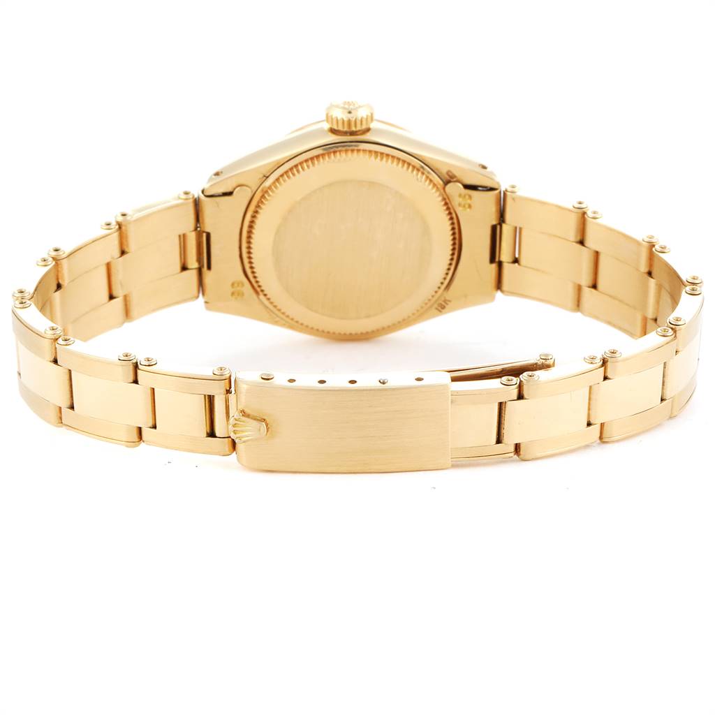 The image shows the back and bracelet of a Rolex Datejust 6917 Women
s Yellow Gold White Dial 6917 Women
s Yellow Gold White Dial watch, highlighting the clasp and case back.