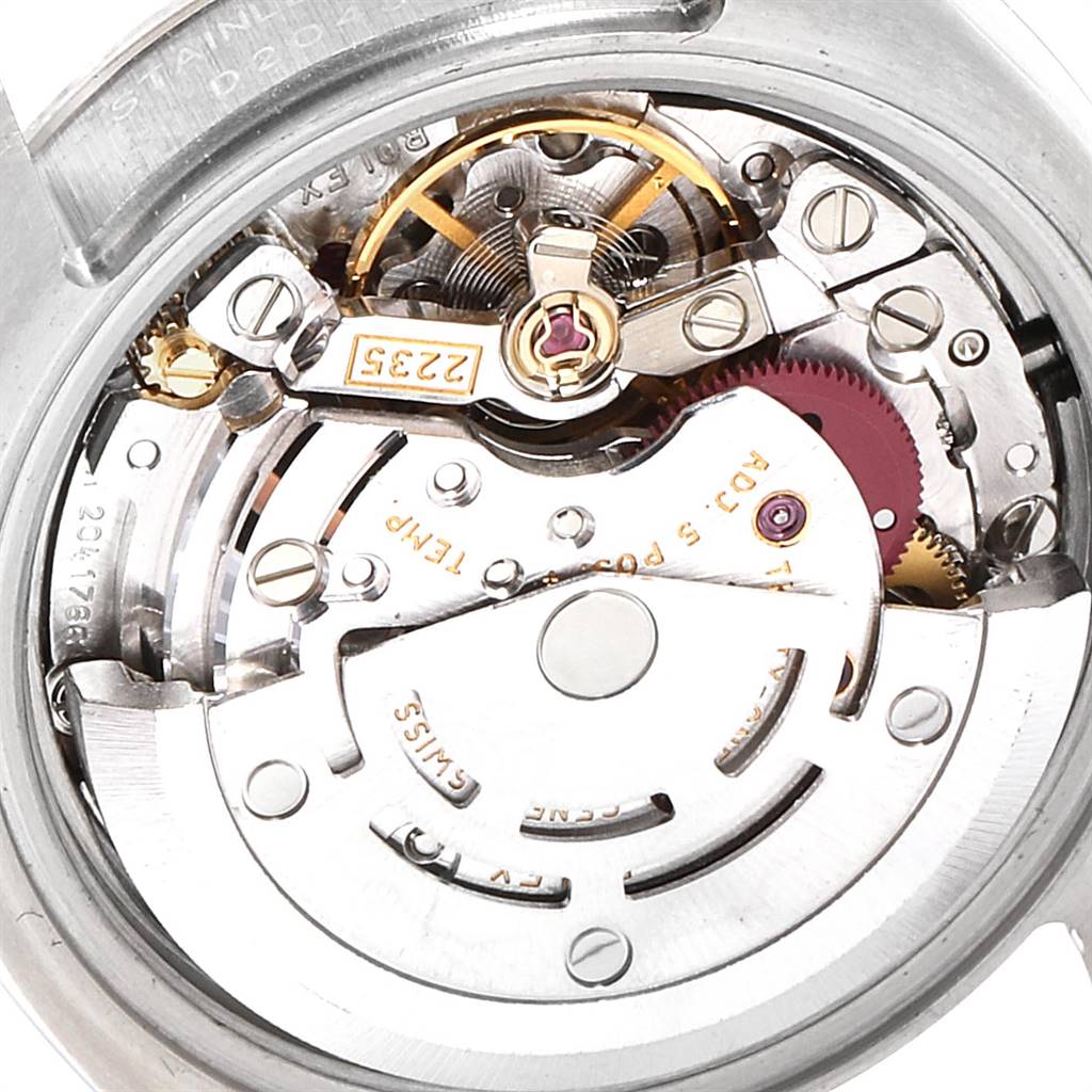 The image shows a close-up view of the movement and internal components of a Rolex Datejust 179174 Women's Stainless Steel Pink Dial 179174 Women's Stainless Steel Pink Dial watch.