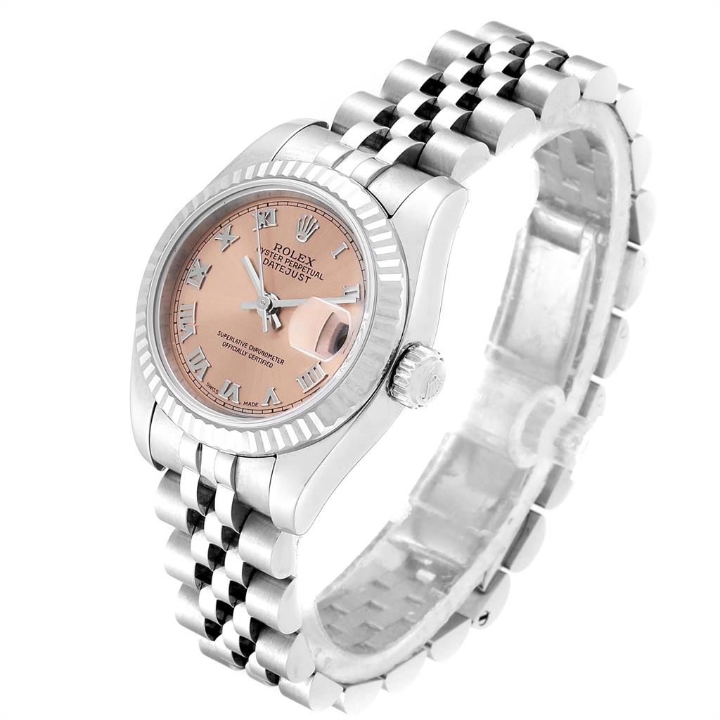 This image shows a Rolex Datejust 179174 Women's Stainless Steel Pink Dial 179174 Women's Stainless Steel Pink Dial watch at an angled view displaying the face, bezel, crown, and Jubilee bracelet.