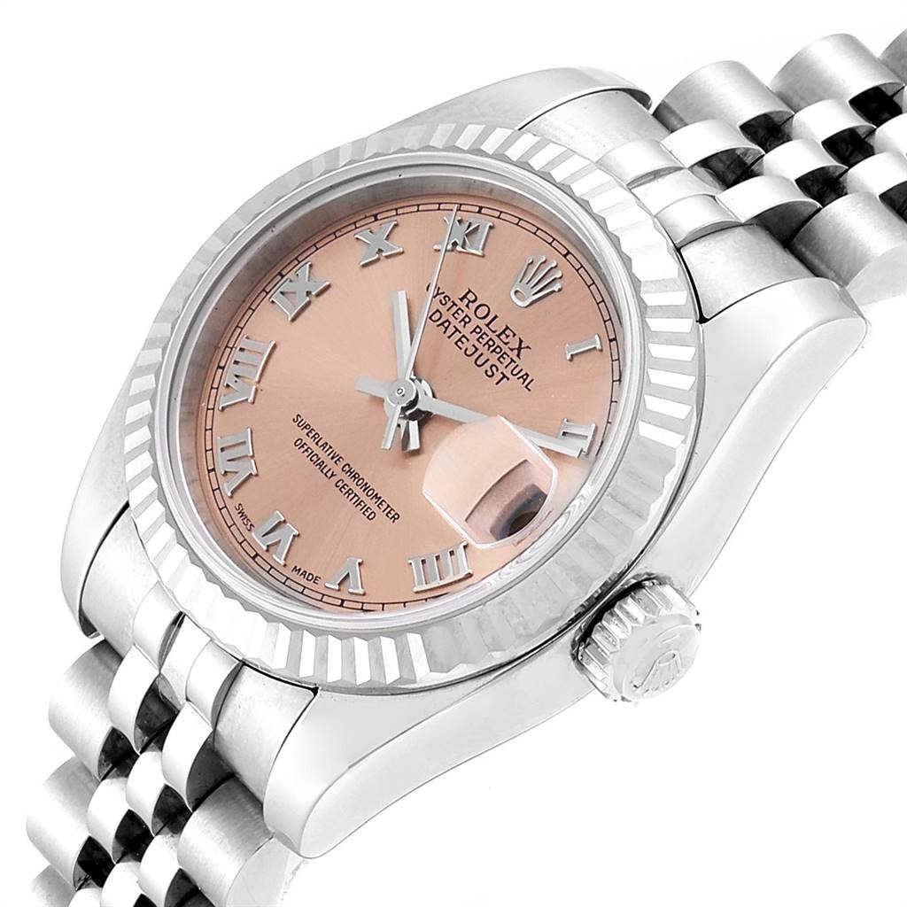 This image shows a Rolex Datejust 179174 Women's Stainless Steel Pink Dial 179174 Women's Stainless Steel Pink Dial watch from a three-quarter angle, showcasing its dial, bezel, crown, and part of the bracelet.