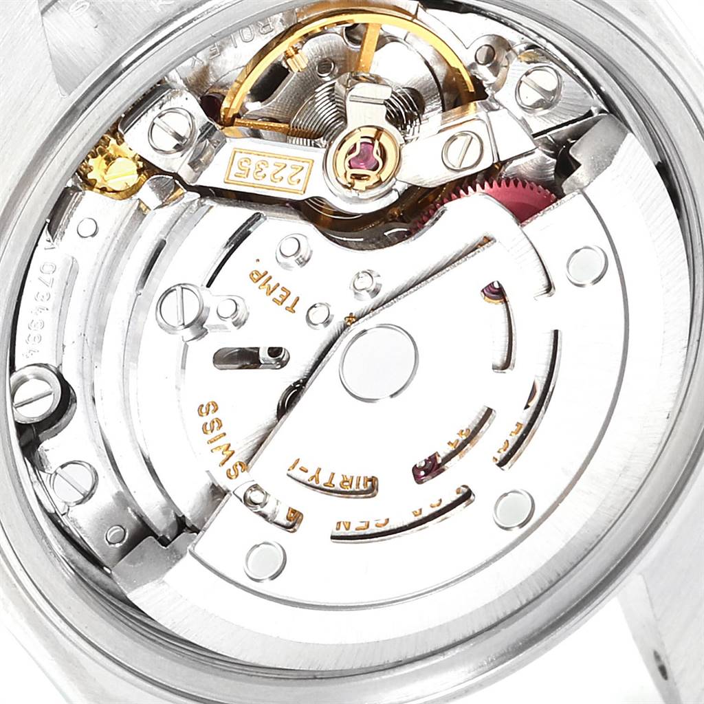 This image shows the inner mechanical components of a Rolex Datejust 79174 Women's Stainless Steel Grey Dial 79174 Women's Stainless Steel Grey Dial watch movement from a close-up angle.