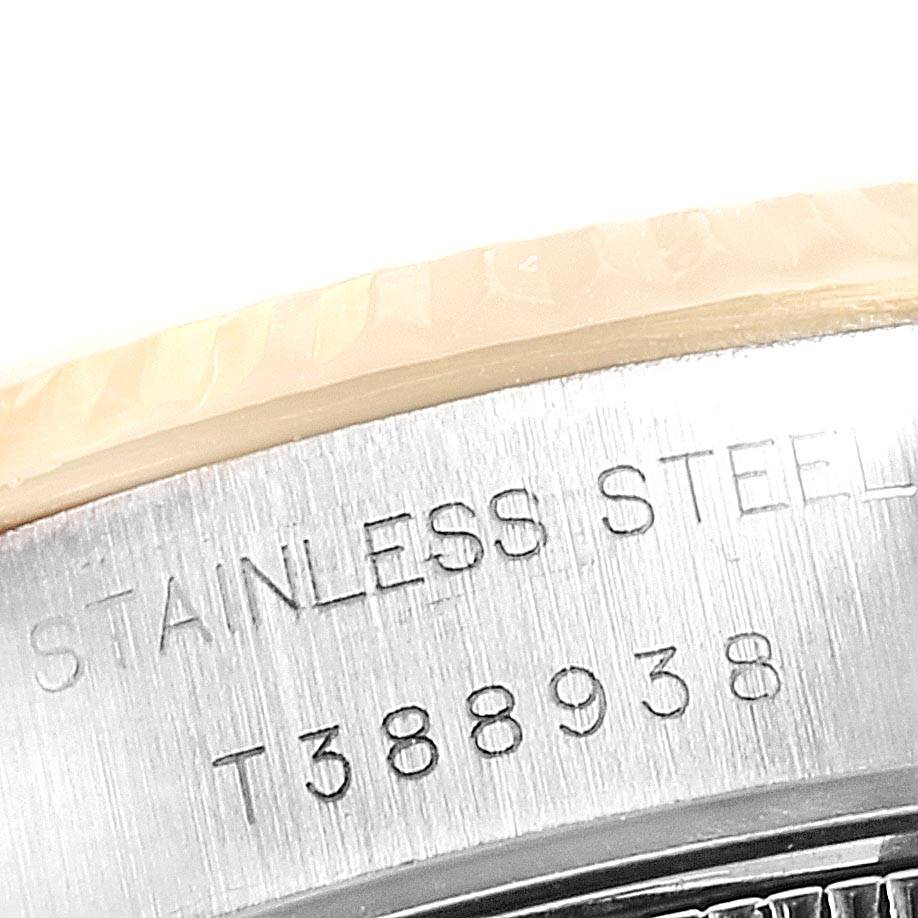 The image shows the case back of a Rolex Datejust 69173 Women's Stainless Steel Black Dial 69173 Women's Stainless Steel Black Dial watch, highlighting its stainless steel engraving and serial number.