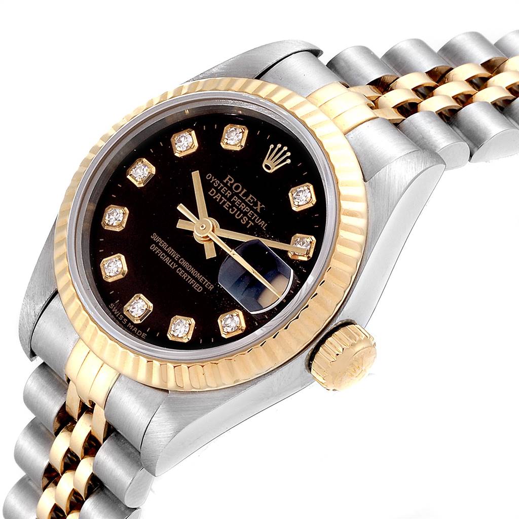 The image shows a close-up angle of the Rolex Datejust 69173 Women's Stainless Steel Black Dial 69173 Women's Stainless Steel Black Dial watch, highlighting its black dial, gold markers, bezel, and two-tone bracelet.