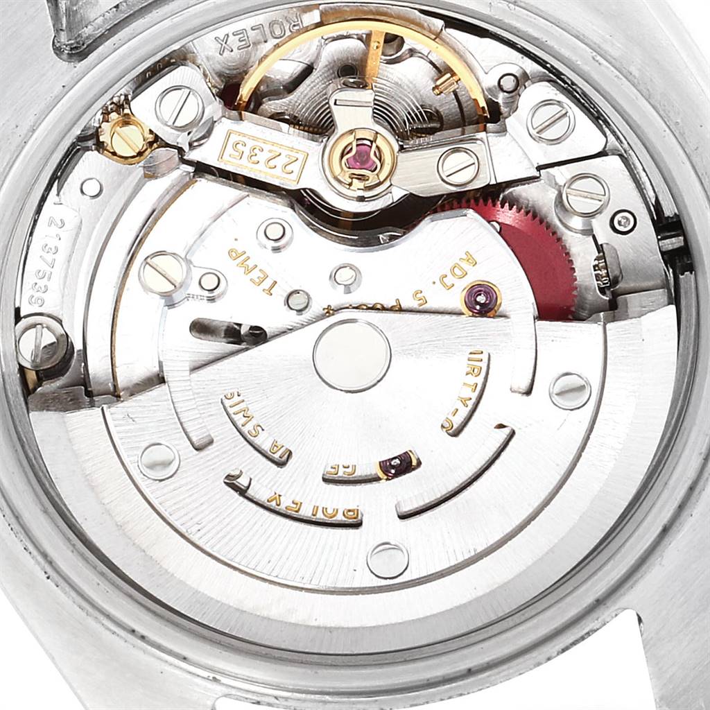 This image shows a close-up of the movement mechanism of a Rolex Datejust 179171 Women's Steel and Gold (two tone) Pink Dial 179171 Women's Steel and Gold (two tone) Pink Dial watch.