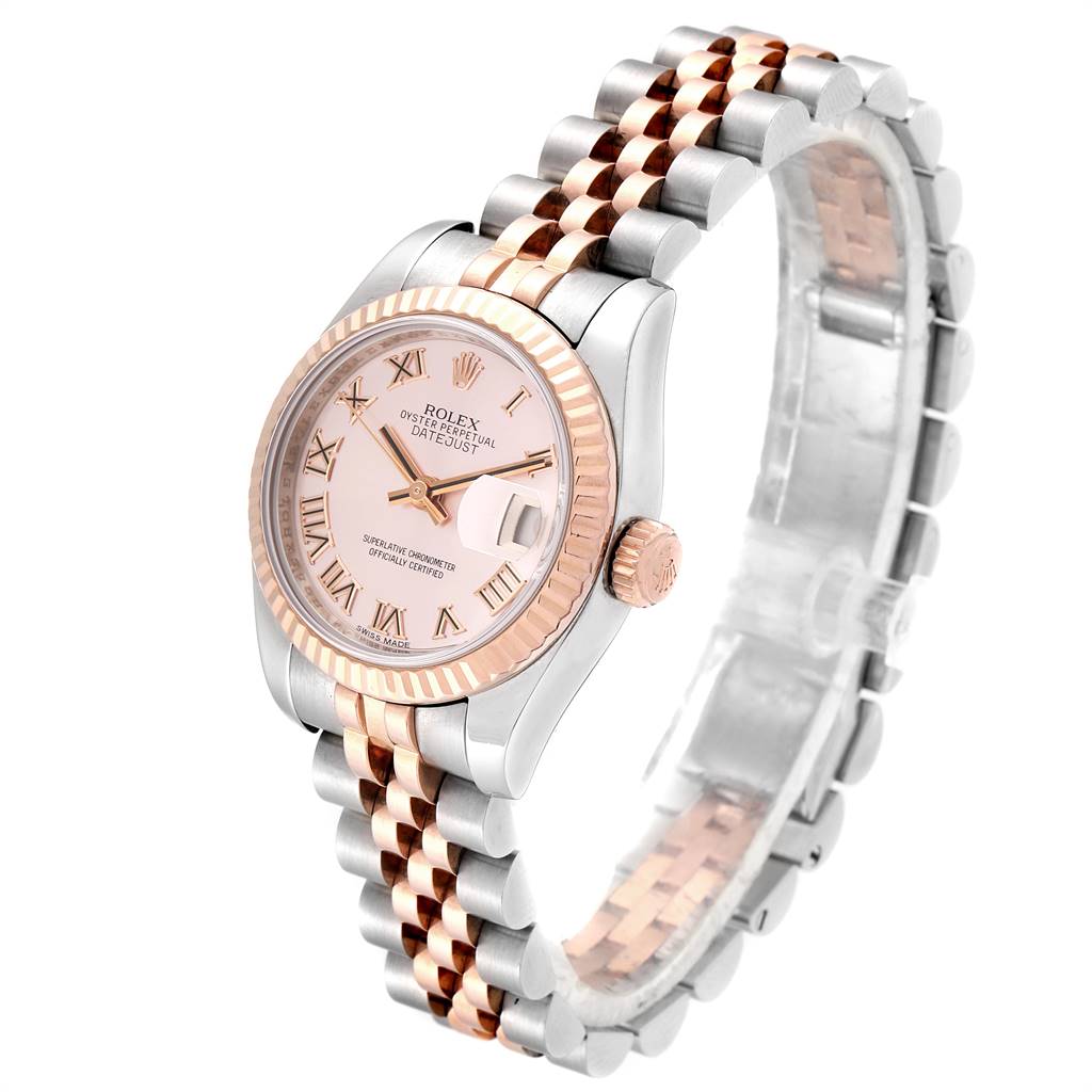 This image shows the Rolex Datejust 179171 Women's Steel and Gold (two tone) Pink Dial 179171 Women's Steel and Gold (two tone) Pink Dial watch at a slight oblique angle, highlighting the face, bezel, crown, and two-tone bracelet.