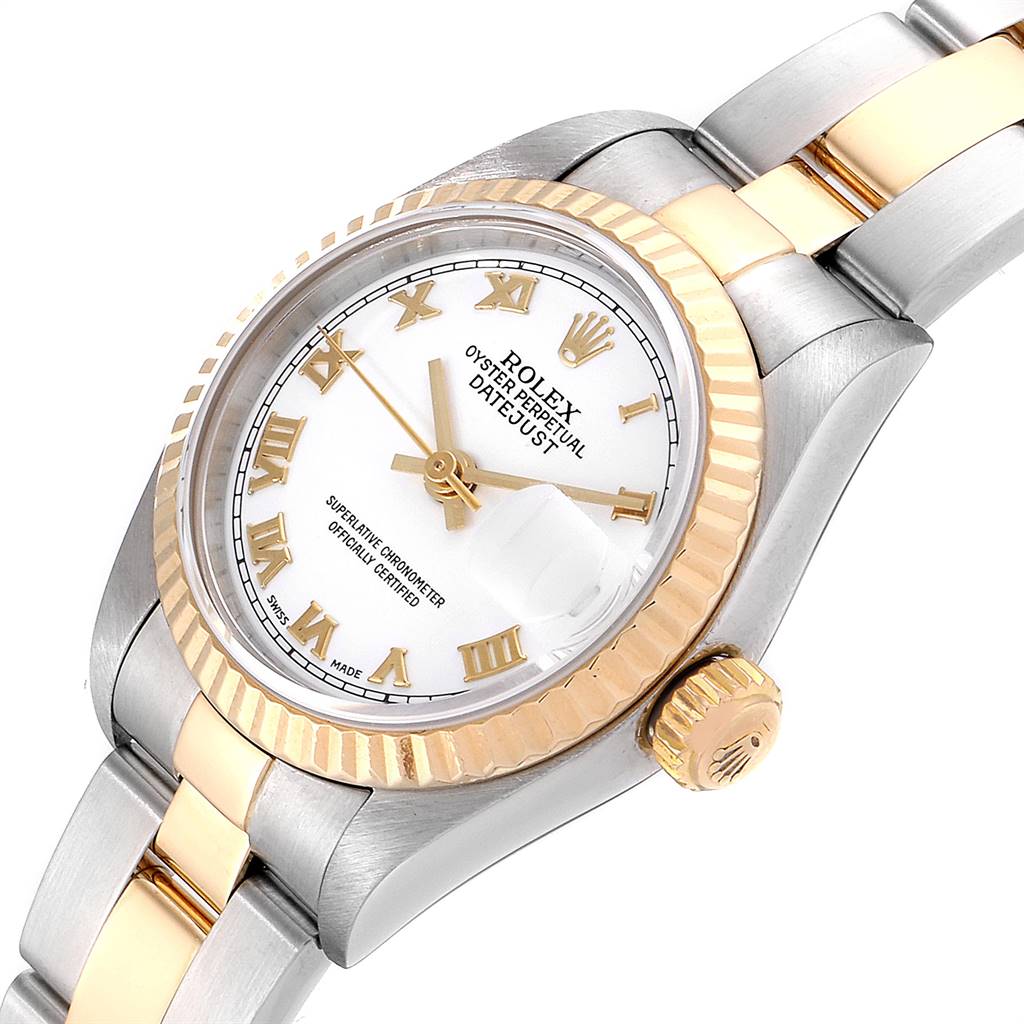 The image shows a close-up of the face, bezel, and part of the bracelet of a Rolex Datejust 79173 Women's Steel and Gold (two tone) White Dial 79173 Women's Steel and Gold (two tone) White Dial watch at an angle from the side.