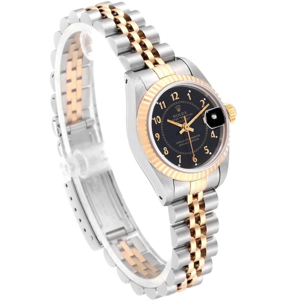 This image shows a Rolex Datejust 69173 Women's Stainless Steel Black Dial 69173 Women's Stainless Steel Black Dial watch at a three-quarter angle, highlighting its face, fluted bezel, and two-tone Jubilee bracelet.
