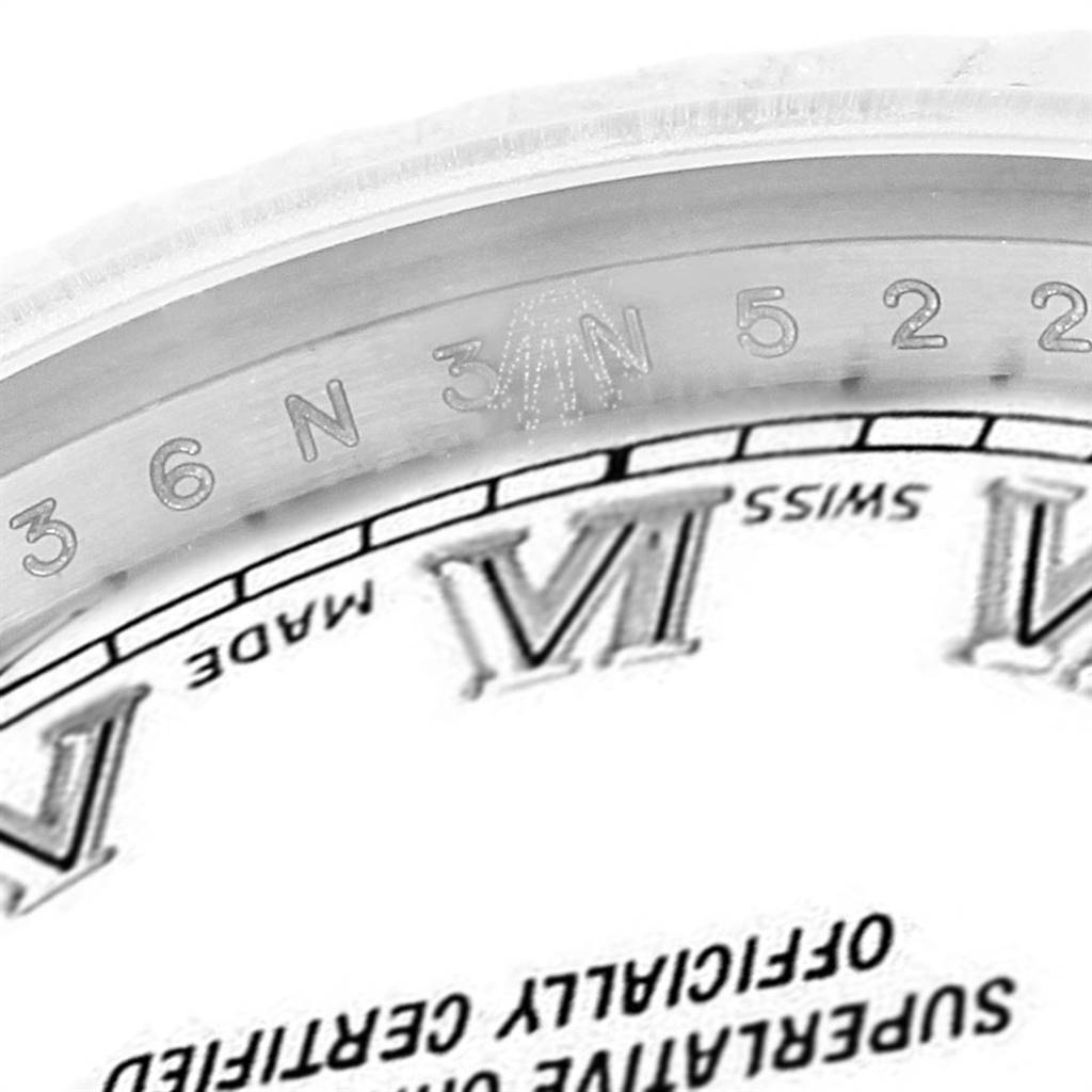 The image shows a close-up angle of the bezel and part of the dial of a Rolex Datejust 179174 Women's Stainless Steel White Dial 179174 Women's Stainless Steel White Dial watch.