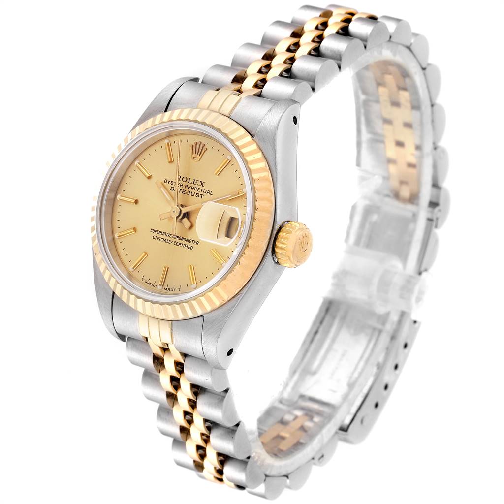 The Rolex Datejust 69173 Women's Stainless Steel Champagne Dial 69173 Women's Stainless Steel Champagne Dial watch is shown at an angle emphasizing the face, crown, and Jubilee two-tone bracelet.