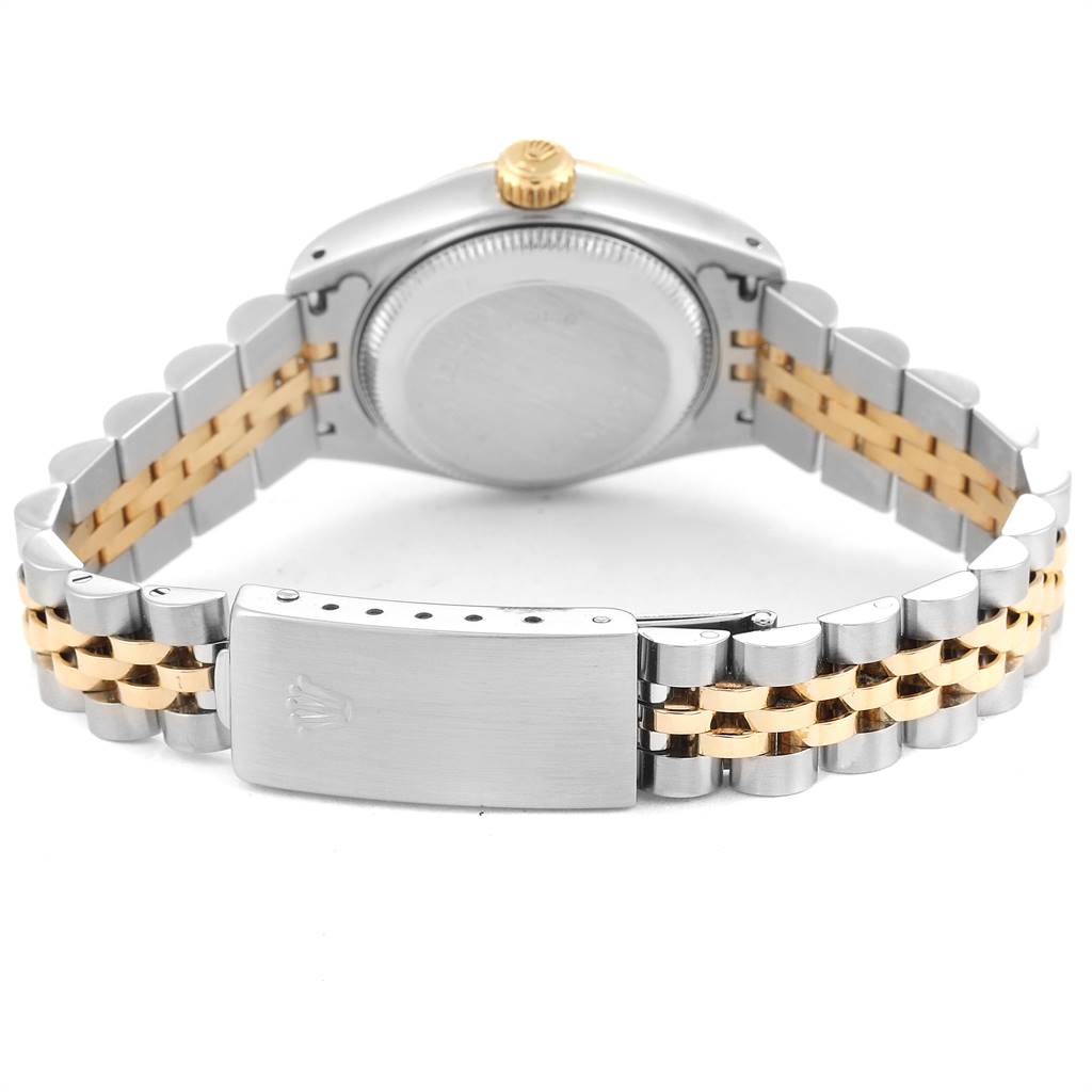 This image shows the back of the Rolex Datejust 69173 Women's Stainless Steel White Dial 69173 Women's Stainless Steel White Dial watch including the case back and dual-tone bracelet clasp.