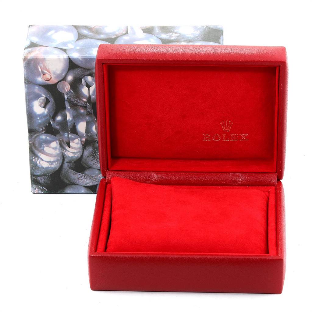 The image shows an empty Rolex Datejust 69173 Women's Stainless Steel White Dial 69173 Women's Stainless Steel White Dial watch box with a red interior and a printed exterior.