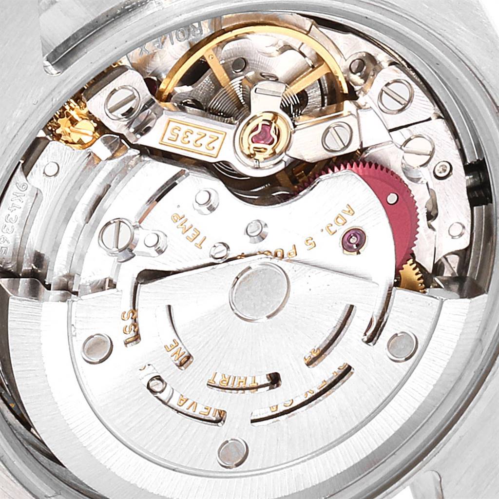 This image shows a close-up view of the movement inside a Rolex Datejust 179383 Women's Steel and Gold (two tone) White Dial 179383 Women's Steel and Gold (two tone) White Dial watch.