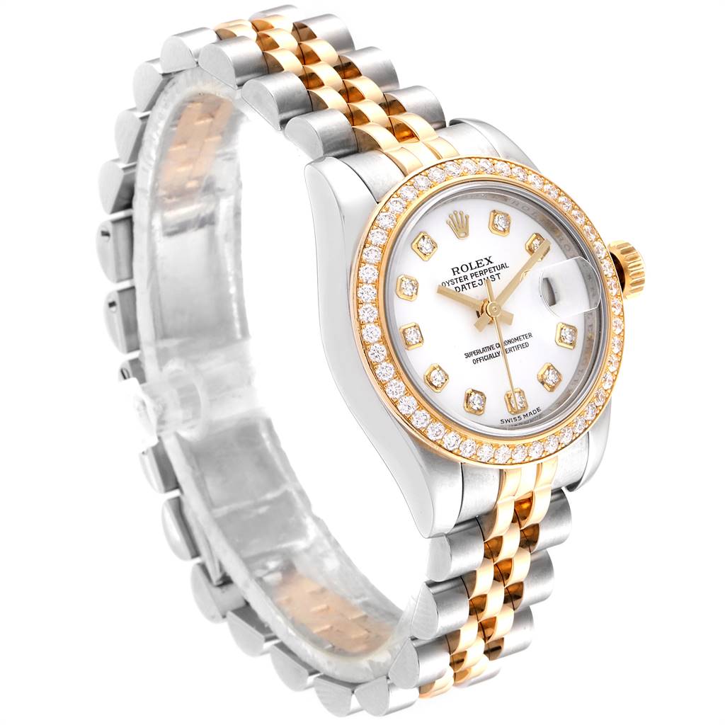 The image shows a Rolex Datejust 179383 Women's Steel and Gold (two tone) White Dial 179383 Women's Steel and Gold (two tone) White Dial watch at a slight angle, highlighting its face, bracelet, and bezel.