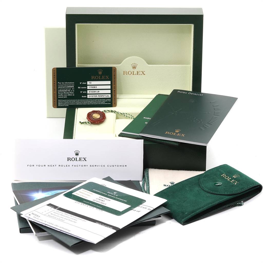 The image shows accessories for the Rolex Datejust 179383 Women's Steel and Gold (two tone) White Dial 179383 Women's Steel and Gold (two tone) White Dial model, including a box, warranty card, manuals, and a tag.