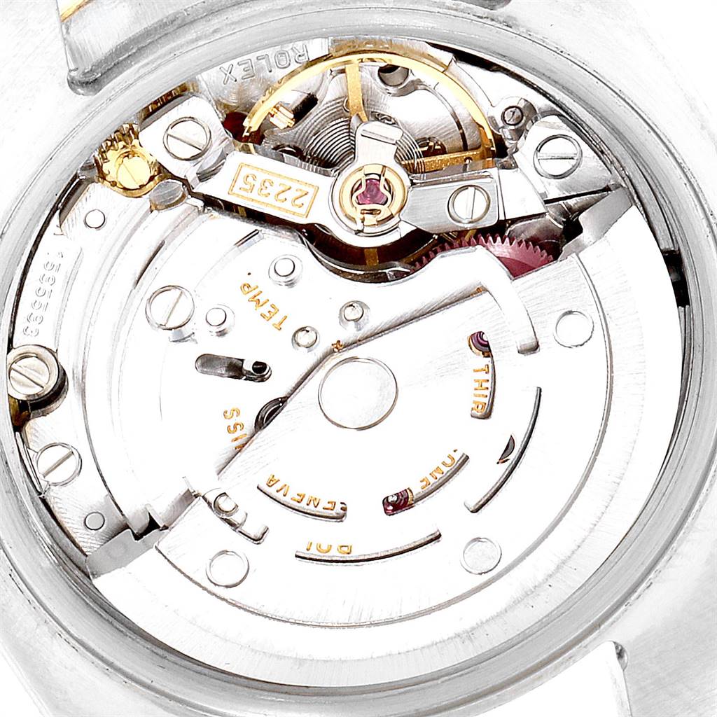 The image shows a close-up of the movement mechanism inside a Rolex Datejust 179173 Women's Steel and Gold (two tone) Blue Dial 179173 Women's Steel and Gold (two tone) Blue Dial watch.