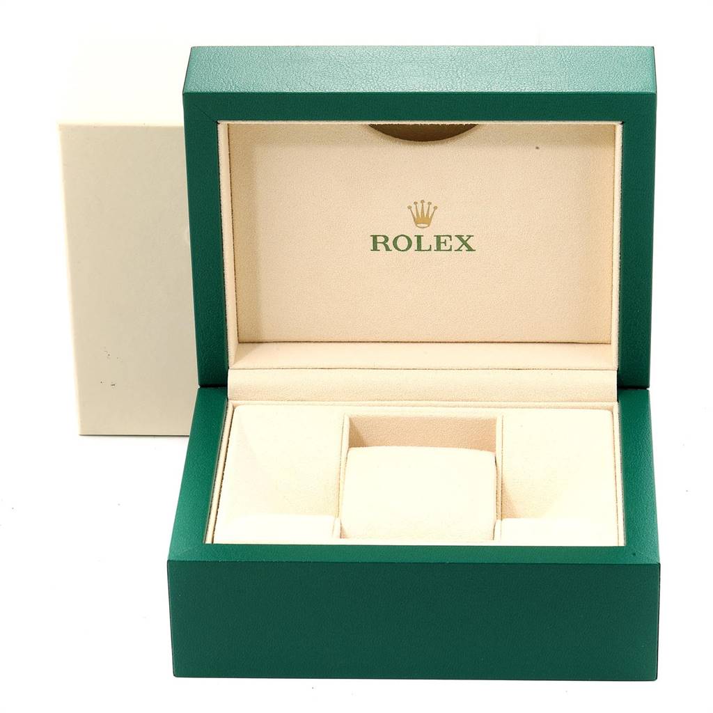 The image shows an open Rolex watch box with the brand logo, designed to hold a Datejust model.