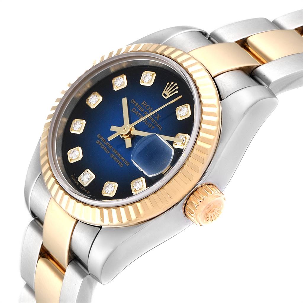The angle shows the side and partial top view of the Rolex Datejust 179173 Women's Steel and Gold (two tone) Blue Dial 179173 Women's Steel and Gold (two tone) Blue Dial, highlighting its dial, bezel, and bracelet.