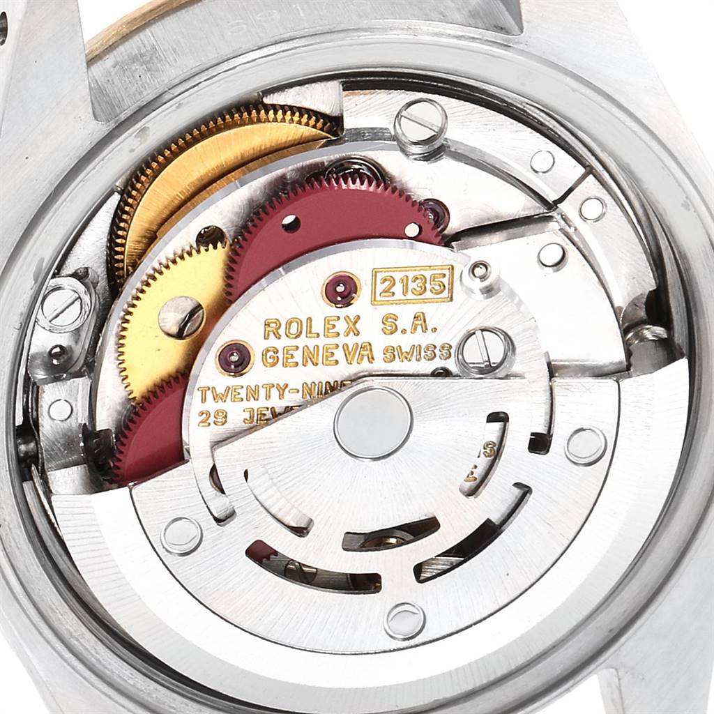 This image shows the inner mechanics and movement of a Rolex Datejust 69173 Women
s Stainless Steel Champagne Dial 69173 Women
s Stainless Steel Champagne Dial watch from a close-up angle.
