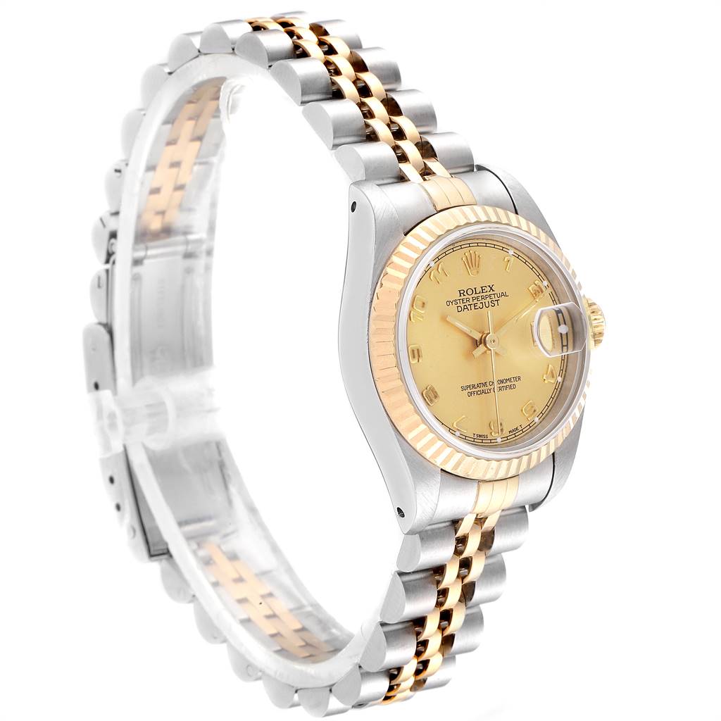 This Rolex Datejust 69173 Women
s Stainless Steel Champagne Dial 69173 Women
s Stainless Steel Champagne Dial watch is shown at a side angle displaying its two-tone bracelet and fluted bezel.