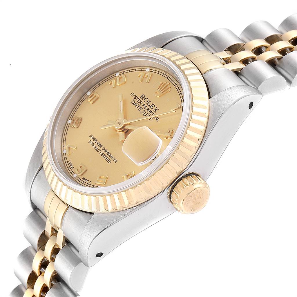 The image shows a Rolex Datejust 69173 Women
s Stainless Steel Champagne Dial 69173 Women
s Stainless Steel Champagne Dial watch at an angled side view, highlighting the case, dial, crown, and part of the bracelet.