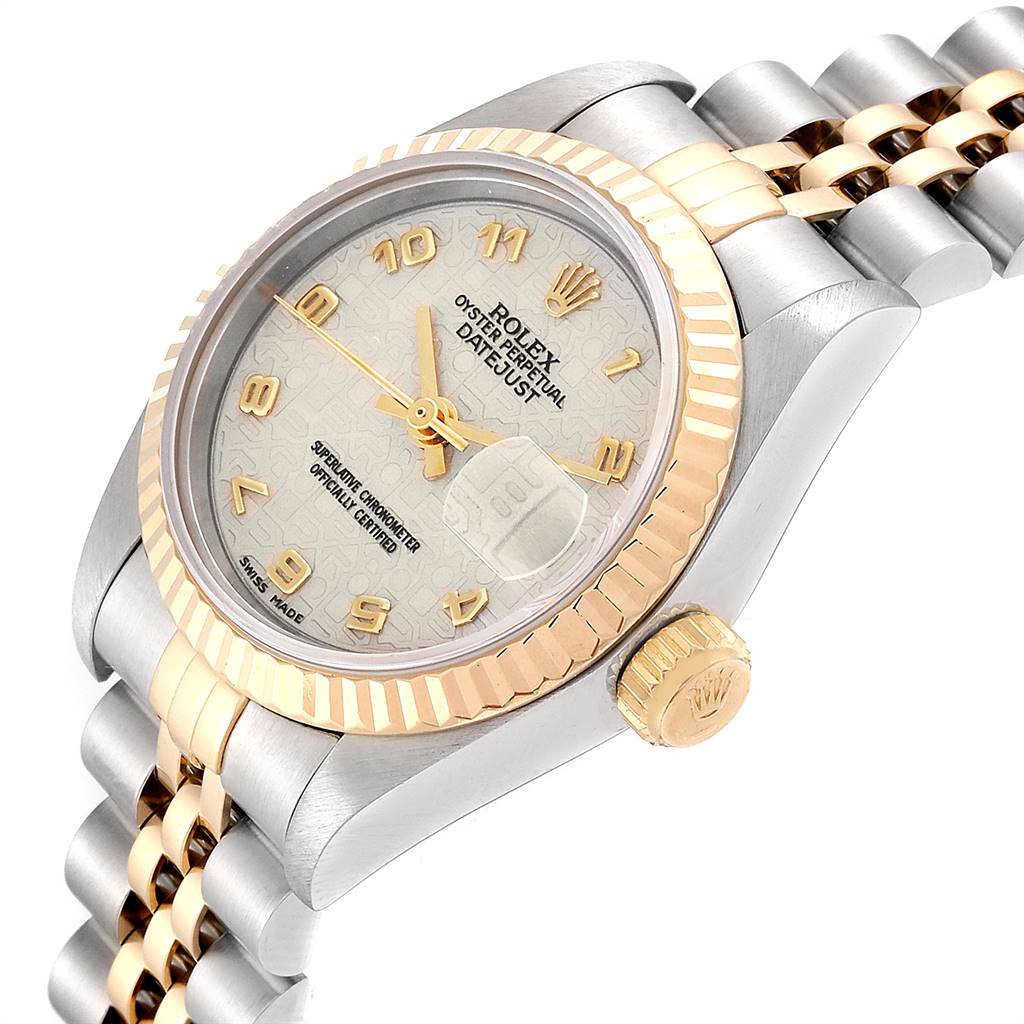 The Rolex Datejust 69173 Women's Stainless Steel Beige Dial 69173 Women's Stainless Steel Beige Dial watch is shown at an angled side view, highlighting the dial, bezel, and part of the bracelet.