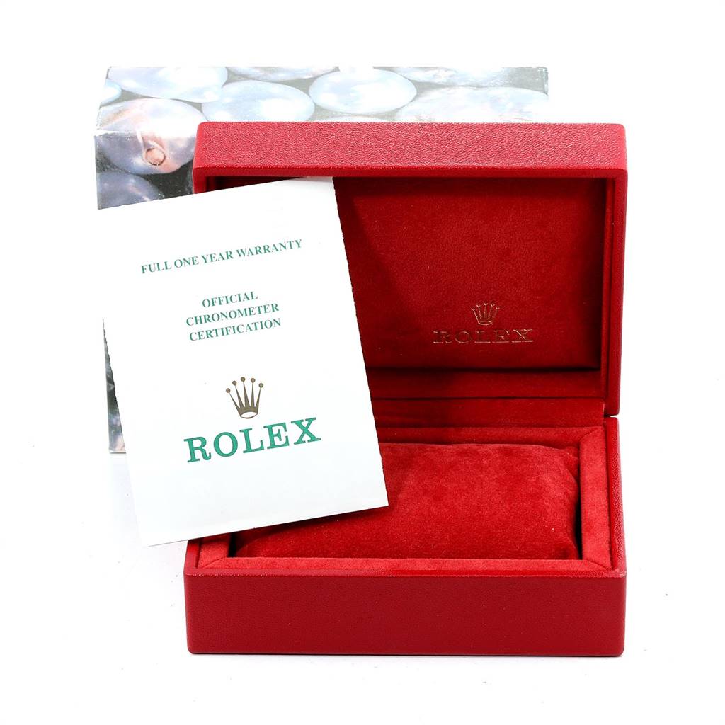 This image shows a red Rolex Datejust 69173 Women's Stainless Steel Beige Dial 69173 Women's Stainless Steel Beige Dial watch box with paperwork, including an official chronometer certification.