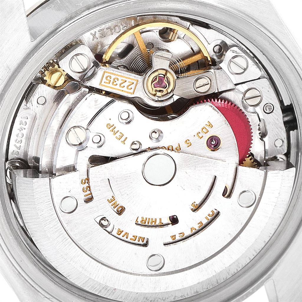This image shows a close-up of the movement and internal mechanics of a Rolex Datejust 79163 Women's Steel and Gold (two tone) Silver Dial 79163 Women's Steel and Gold (two tone) Silver Dial watch.