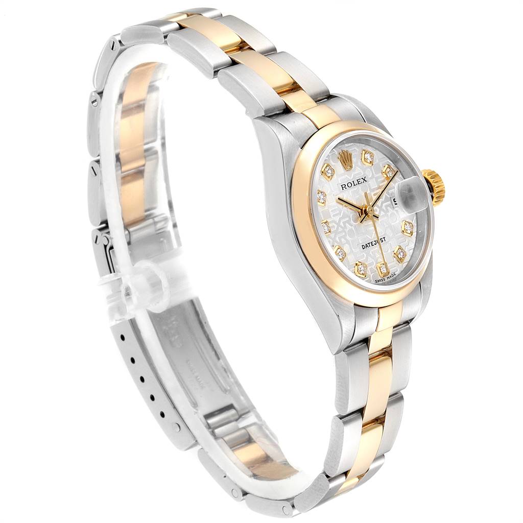 The Rolex Datejust 79163 Women's Steel and Gold (two tone) Silver Dial 79163 Women's Steel and Gold (two tone) Silver Dial watch is shown at a side angle, displaying its bezel, dial, case, and bracelet.