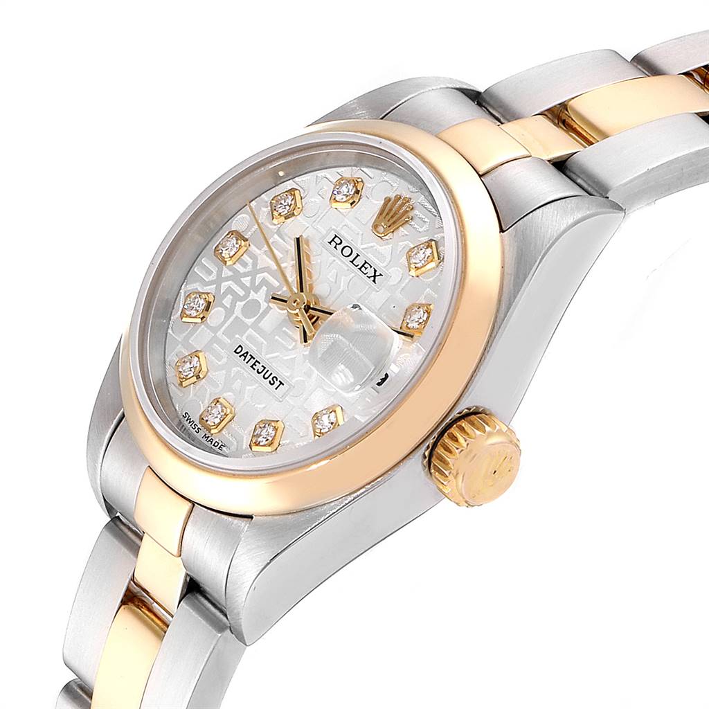 This image shows a close-up angle of a Rolex Datejust 79163 Women's Steel and Gold (two tone) Silver Dial 79163 Women's Steel and Gold (two tone) Silver Dial watch, highlighting its dial, bezel, crown, and part of the bracelet.