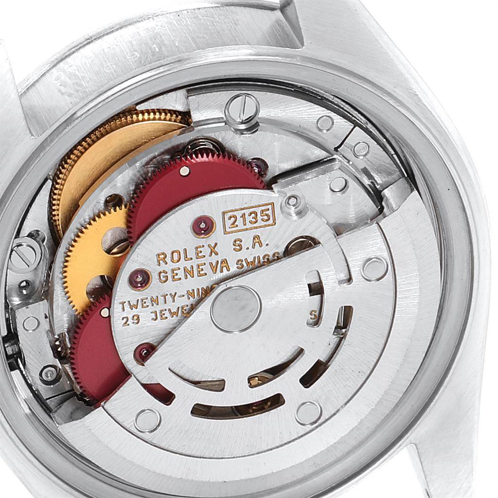 This image shows the intricate internal mechanism of a Rolex Datejust 69173 Women's Stainless Steel White Dial 69173 Women's Stainless Steel White Dial watch, focusing on the movement and gears.
