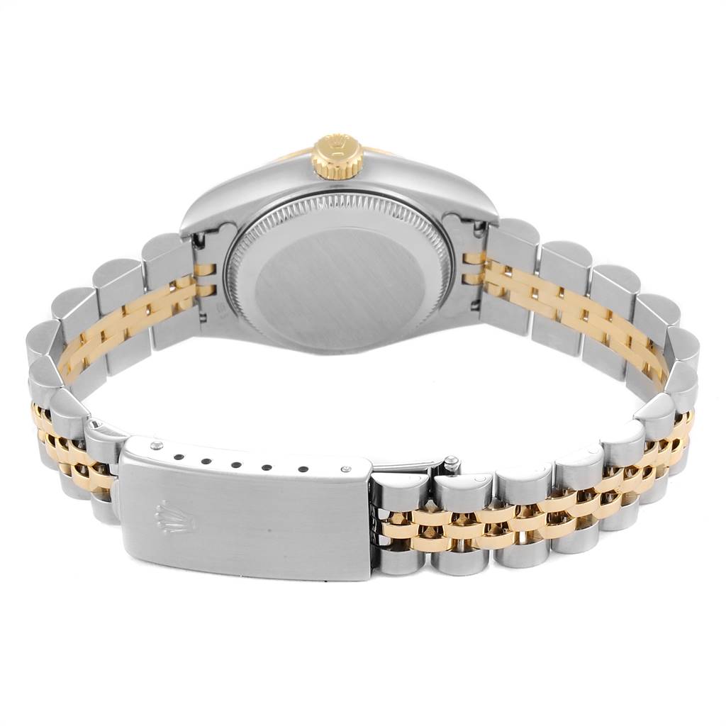 This image shows the back view of a Rolex Datejust 69173 Women's Stainless Steel White Dial 69173 Women's Stainless Steel White Dial watch, highlighting its case back, crown, and two-tone bracelet.