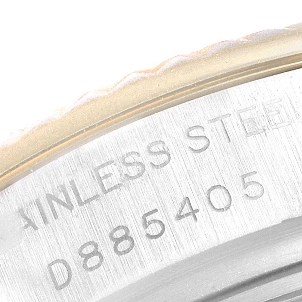The image shows a close-up of the serial number and "STAINLESS STEEL" engraving on the case back of a Rolex Datejust 179173 Women's Steel and Gold (two tone) Silver Dial 179173 Women's Steel and Gold (two tone) Silver Dial watch.