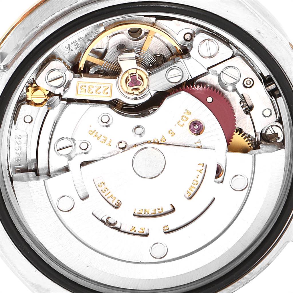 The image shows a close-up view of the internal movement mechanism of a Rolex Datejust 179173 Women's Steel and Gold (two tone) Silver Dial 179173 Women's Steel and Gold (two tone) Silver Dial watch.
