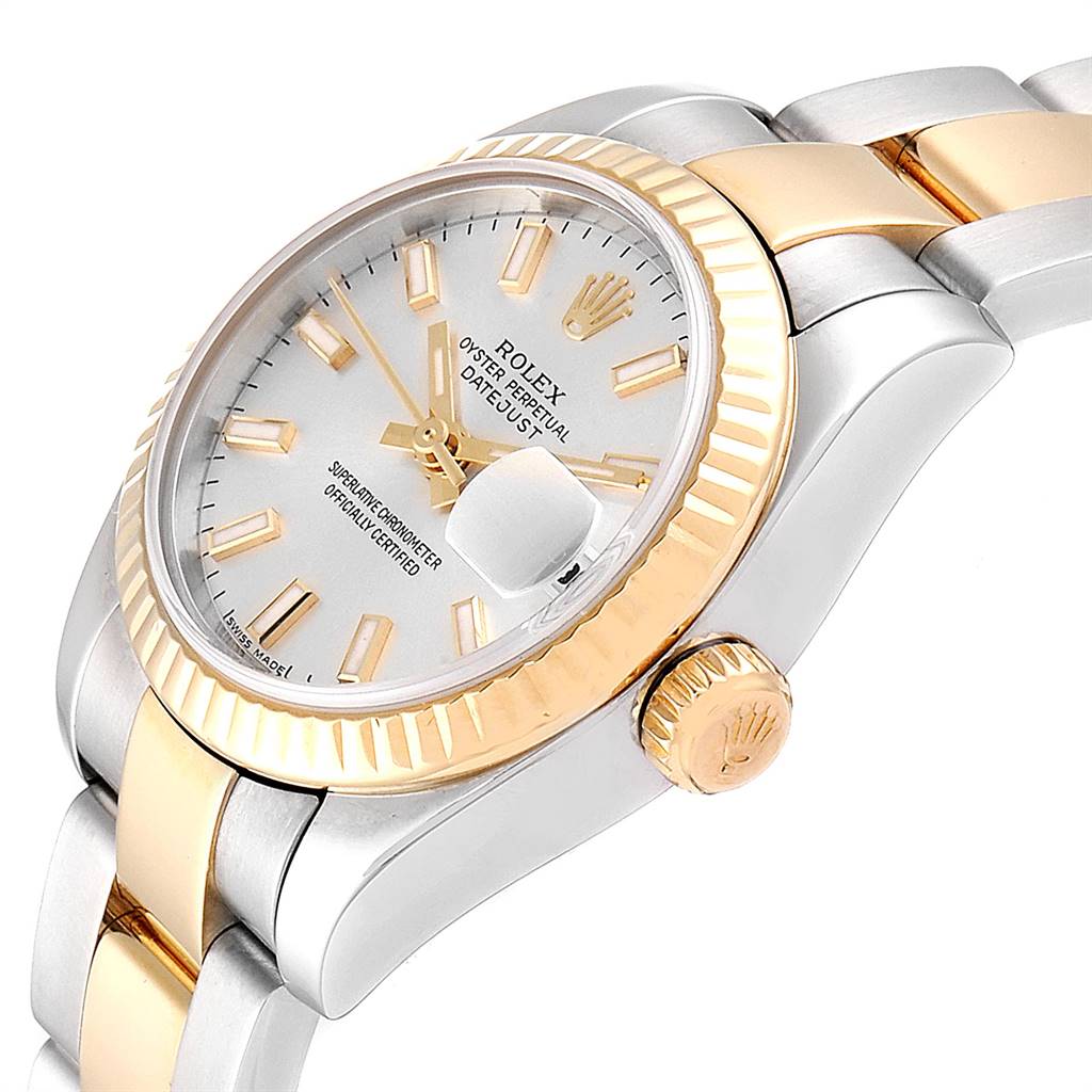 This image shows a close-up, angled view of the Rolex Datejust 179173 Women's Steel and Gold (two tone) Silver Dial 179173 Women's Steel and Gold (two tone) Silver Dial watch, highlighting the dial, bezel, crown, and part of the bracelet.