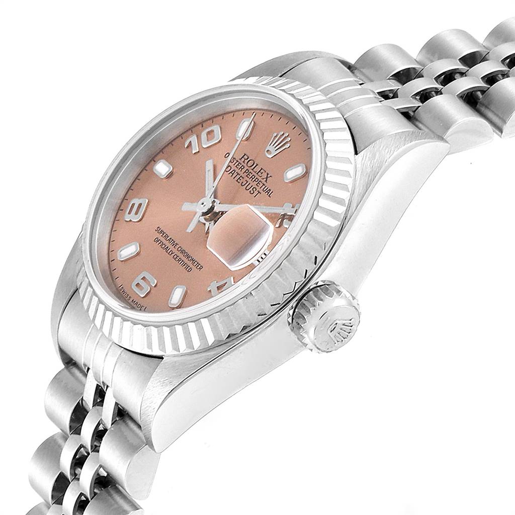 The image shows a side angle of the Rolex Datejust 79174 Women's Stainless Steel Pink Dial 79174 Women's Stainless Steel Pink Dial watch, highlighting the dial, crown, and part of the bracelet.