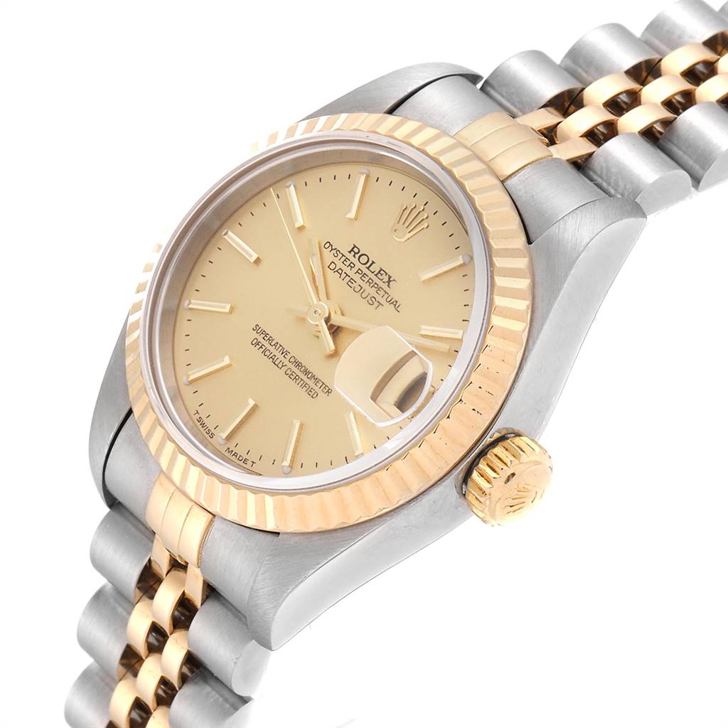This is a close-up angled view of the Rolex Datejust 79173 Women
s Steel and Gold (two tone) Champagne Dial 79173 Women
s Steel and Gold (two tone) Champagne Dial watch showing the dial, crown, and part of the bracelet.