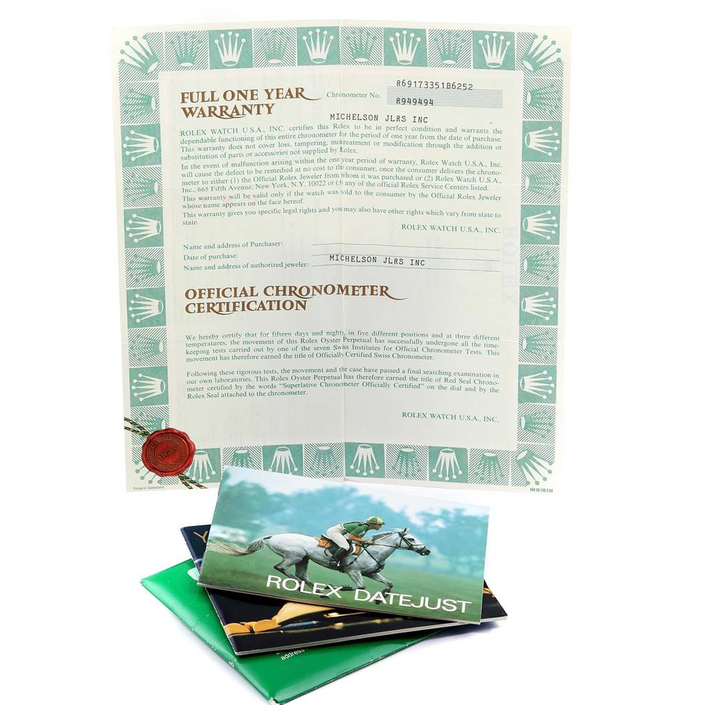 The image shows the warranty, chronometer certification, and booklets for a Rolex Datejust 69173 Women's Stainless Steel White Dial 69173 Women's Stainless Steel White Dial watch.