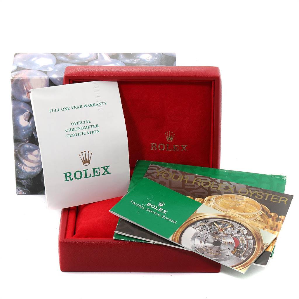The image shows the packaging, warranty card, and booklets for the Rolex Datejust 69173 Women's Stainless Steel Beige Dial 69173 Women's Stainless Steel Beige Dial model, but not the watch itself.