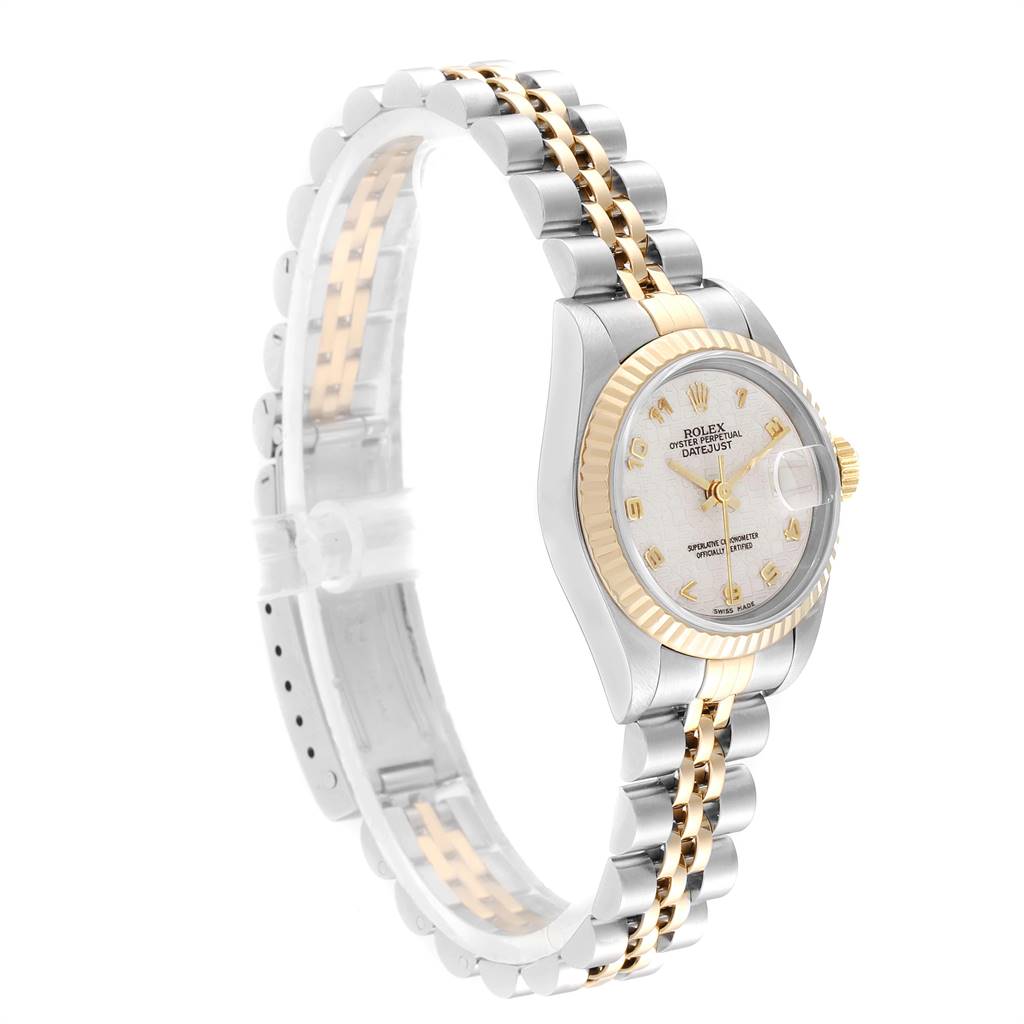 This image shows a side angle of a Rolex Datejust 69173 Women's Stainless Steel Beige Dial 69173 Women's Stainless Steel Beige Dial watch, highlighting the face, bezel, and bracelet.