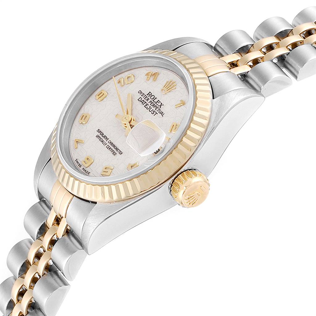 The image shows a side angle of the Rolex Datejust 69173 Women's Stainless Steel Beige Dial 69173 Women's Stainless Steel Beige Dial, displaying the bezel, crown, and part of the bracelet.