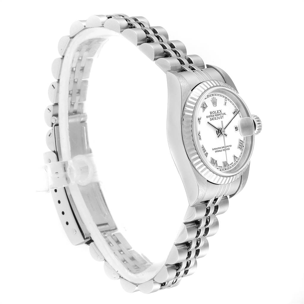 The Rolex Datejust 79174 Women
s Stainless Steel White Dial 79174 Women
s Stainless Steel White Dial watch is shown at a slight side angle, displaying the face, bezel, and part of the band.