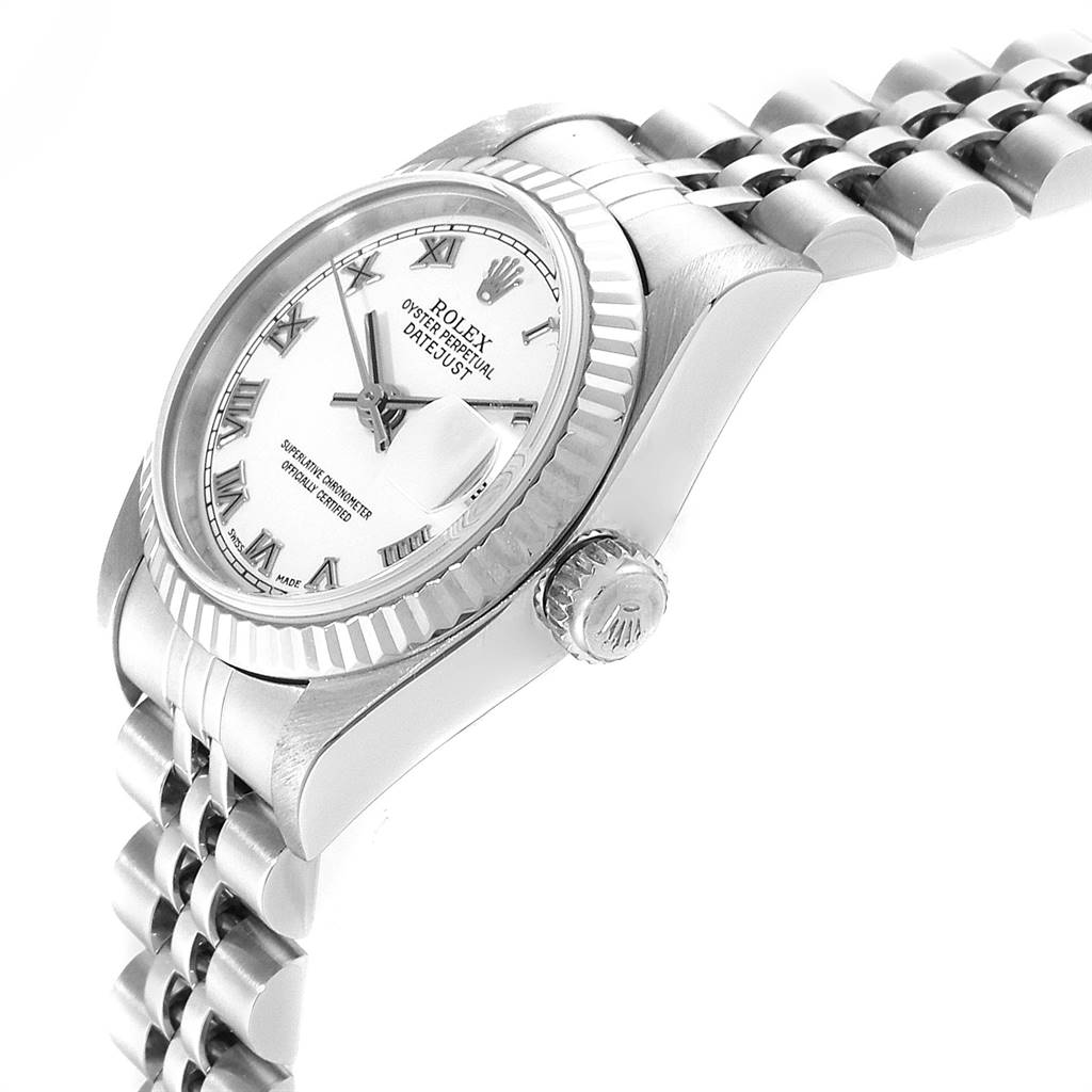 This image shows a side angle view of a Rolex Datejust 79174 Women
s Stainless Steel White Dial 79174 Women
s Stainless Steel White Dial watch, highlighting the face, bezel, crown, and part of the bracelet.