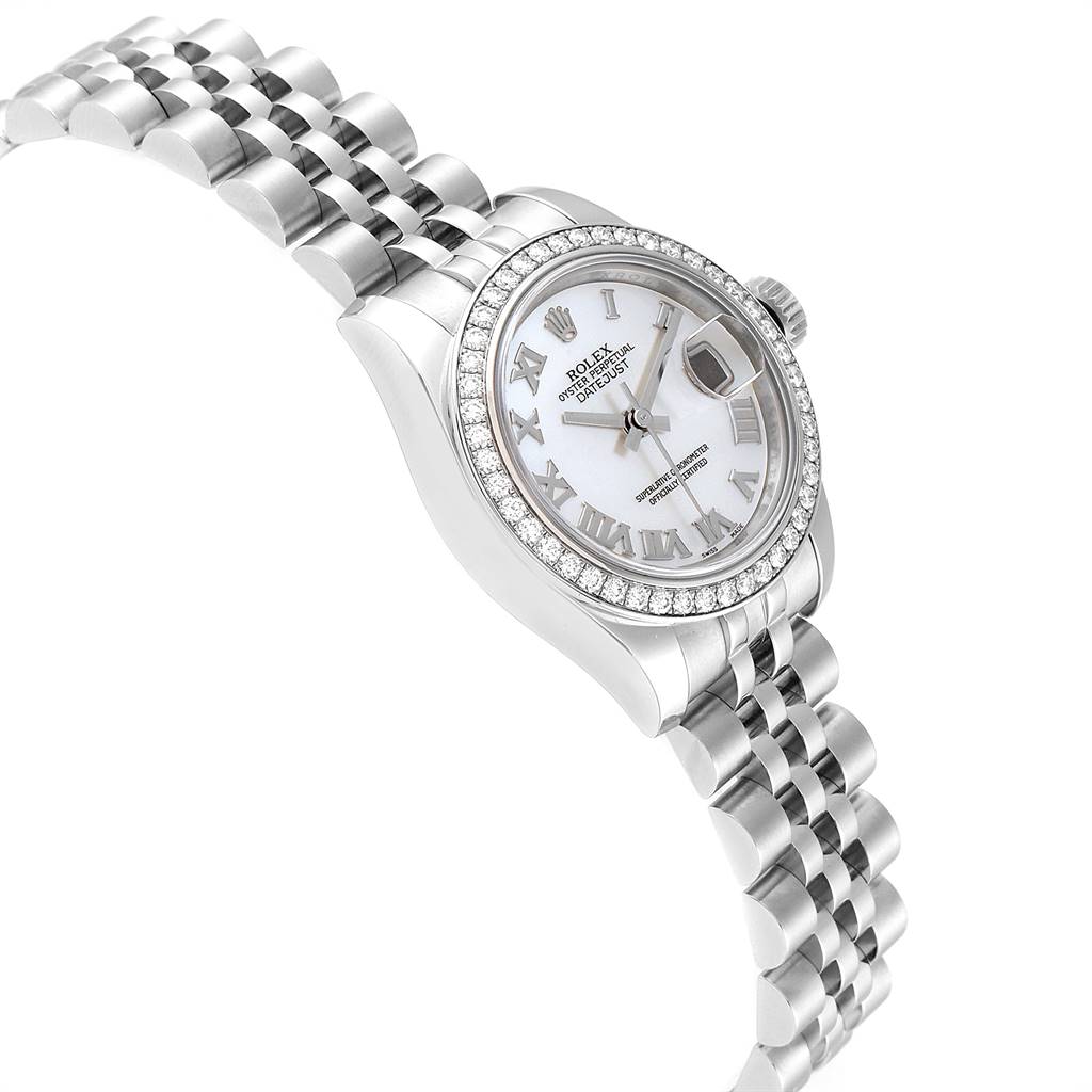 The image shows a side-angle close-up view of a Rolex Datejust 179384 Women's Stainless Steel Mother of Pearl Dial 179384 Women's Stainless Steel Mother of Pearl Dial watch featuring the face, bezel, and part of the bracelet.