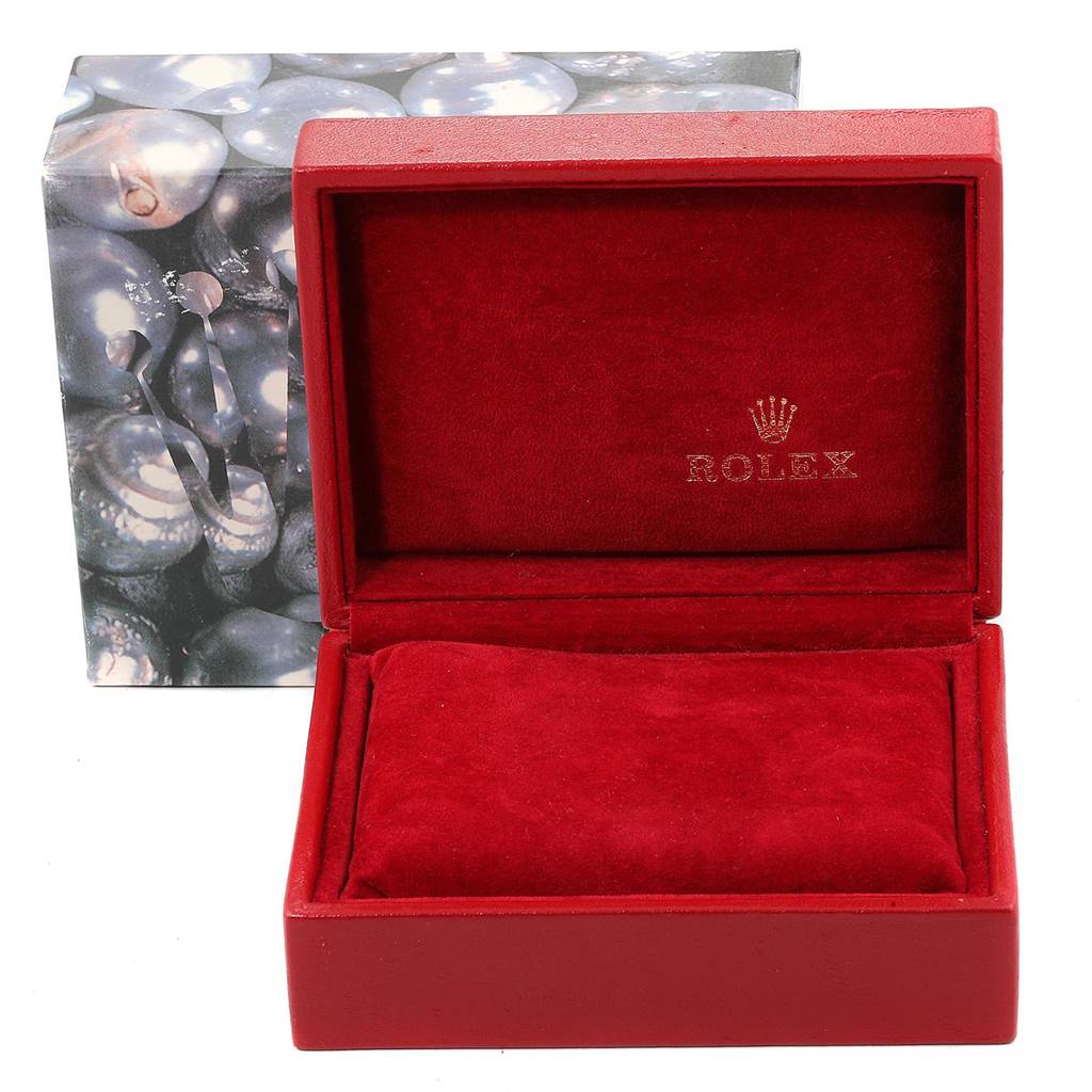 This image shows a Rolex Datejust 69163 Women's Stainless Steel Grey Dial 69163 Women's Stainless Steel Grey Dial watch box open, revealing a red velvet interior with the Rolex logo inside the lid.