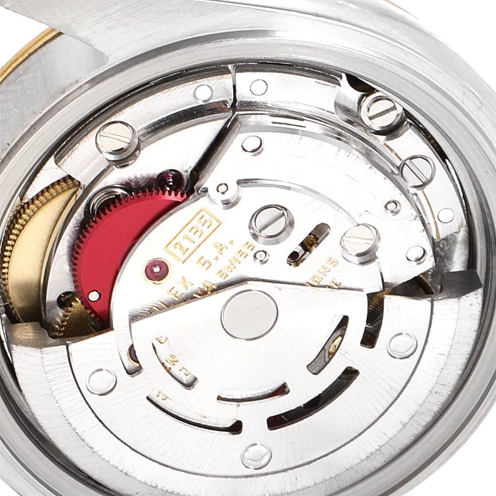 This is a close-up angle showing the inner movement mechanism of the Rolex Datejust 69173 Women's Stainless Steel White Dial 69173 Women's Stainless Steel White Dial watch.