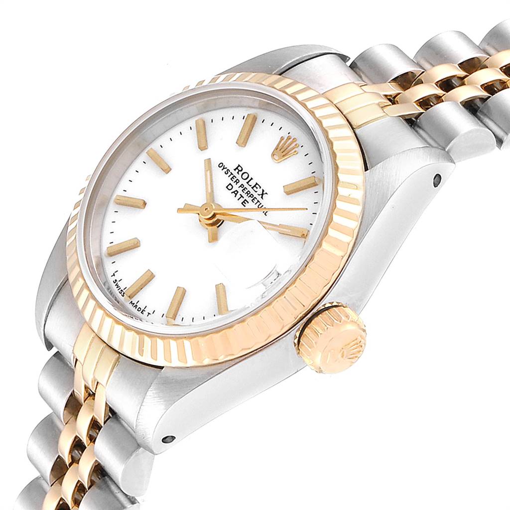 This image shows a Rolex Datejust 69173 Women's Stainless Steel White Dial 69173 Women's Stainless Steel White Dial watch from an angled side view, highlighting the face, fluted bezel, and crown.