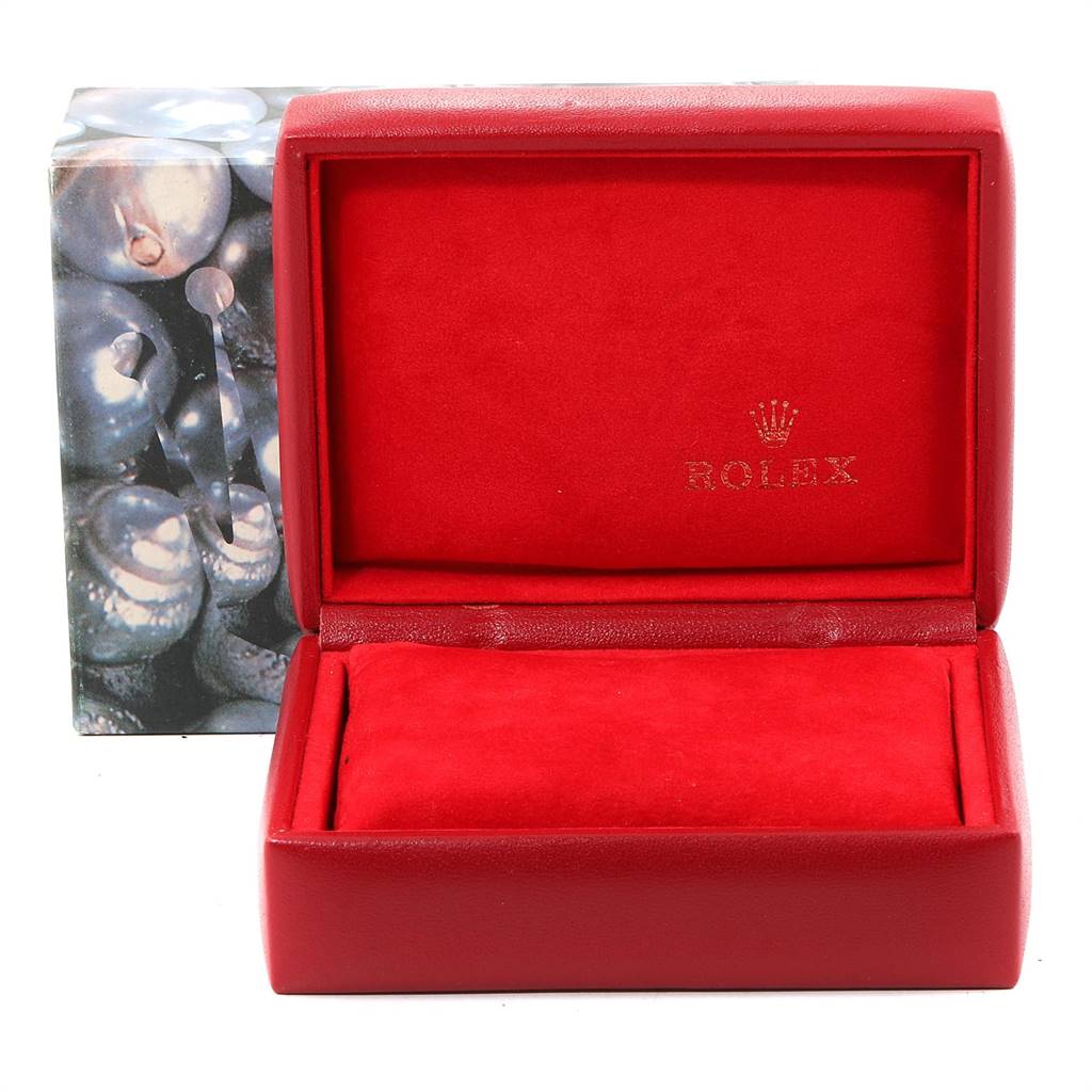 This image shows an open, red Rolex Datejust 69173 Women's Steel and Gold (two tone) White Dial 69173 Women's Steel and Gold (two tone) White Dial watch box with the Rolex logo inside the lid.