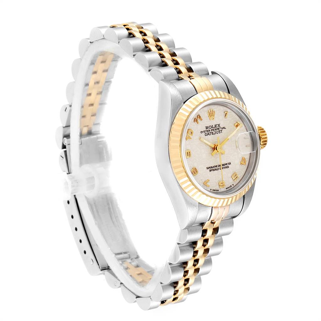 The image shows a Rolex Datejust 69173 Women's Stainless Steel Beige Dial 69173 Women's Stainless Steel Beige Dial watch from an angled side view, highlighting its dial, fluted bezel, and Jubilee bracelet.
